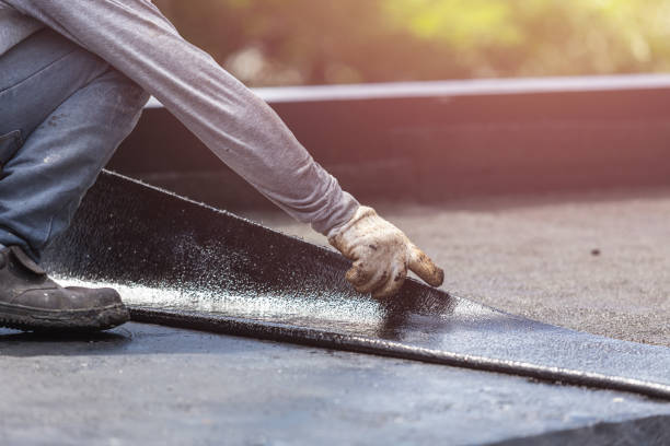 Professional Basement Waterproofing technician working in Iowa, LA